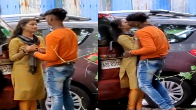 Couple outdoor kissing and boobs pressing capture